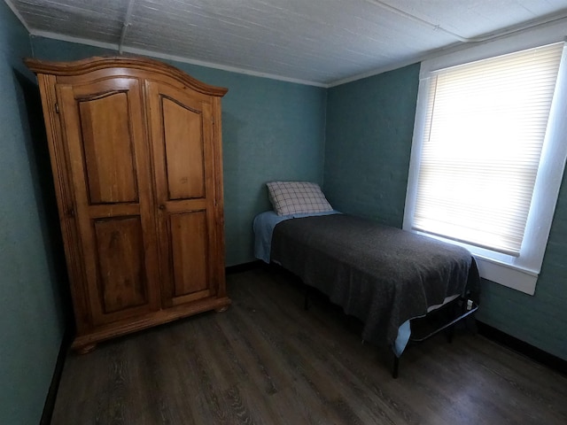 bedroom featuring dark wood-type flooring