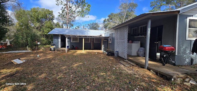 exterior space with washer / clothes dryer