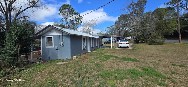 view of property exterior featuring a yard