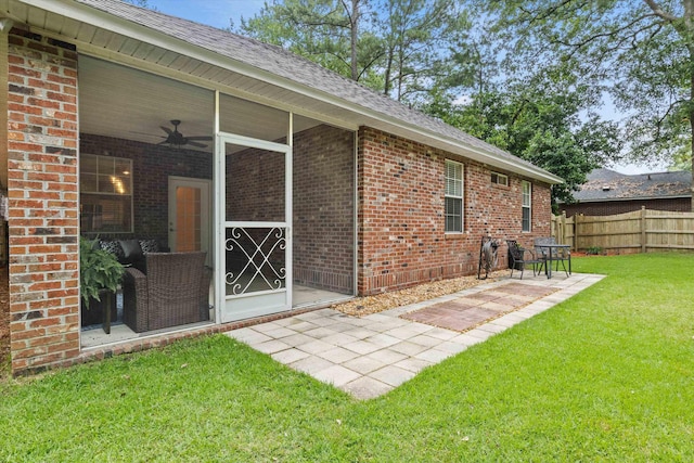 1652 Eagles Watch Way, Tallahassee, FL 32312 - rear view of property with brick siding, a patio area, and a shingled roof