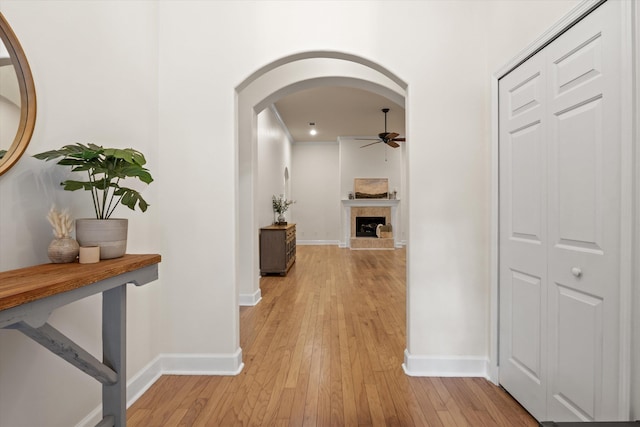 1652 Eagles Watch Way, Tallahassee, FL 32312 - corridor featuring arched walkways and light wood-style flooring