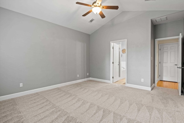 1652 Eagles Watch Way, Tallahassee, FL 32312 - unfurnished bedroom featuring light colored carpet, connected bathroom, ceiling fan, and high vaulted ceiling