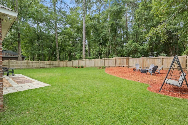 1652 Eagles Watch Way, Tallahassee, FL 32312 - fenced backyard featuring a patio area and view of scattered trees