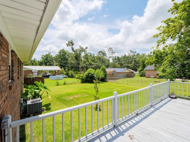 405 NW Whispering Pines Loop, Madison, FL 32340 - deck featuring a yard