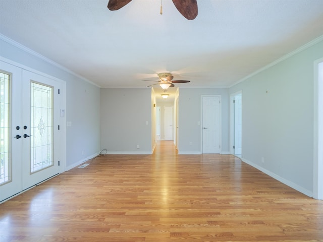 405 NW Whispering Pines Loop, Madison, FL 32340 - spare room with a ceiling fan, french doors, light wood-style flooring, and crown molding