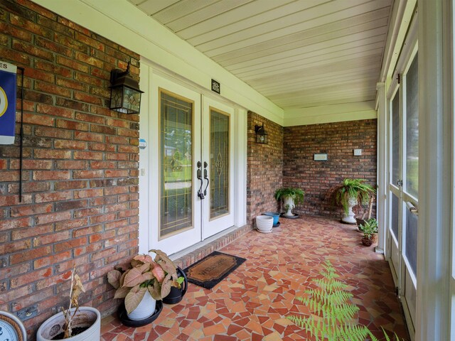 405 NW Whispering Pines Loop, Madison, FL 32340 - covered porch featuring french doors