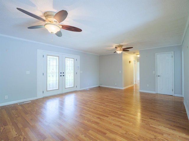 405 NW Whispering Pines Loop, Madison, FL 32340 - empty room with ceiling fan, light wood-style flooring, crown molding, and french doors