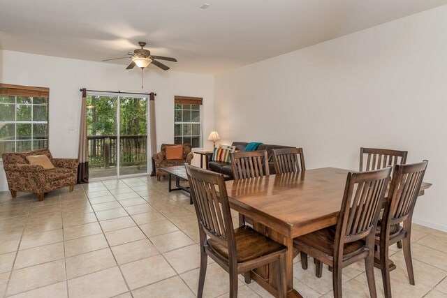 dining room featuring light tile patterned floors and ceiling fan