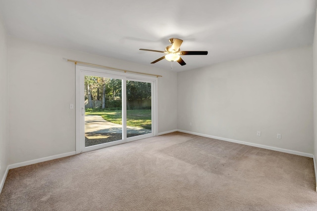 unfurnished room with carpet flooring and ceiling fan