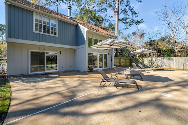 rear view of property featuring a patio