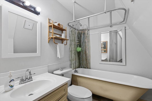 full bathroom with shower / tub combo, vanity, and toilet