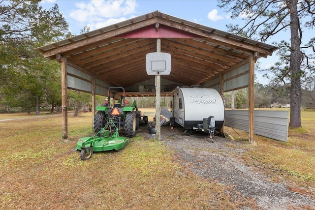 view of outbuilding featuring a carport