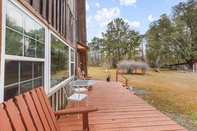 deck with a gazebo and a lawn