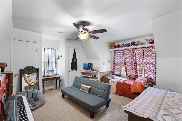 bedroom featuring light carpet and ceiling fan