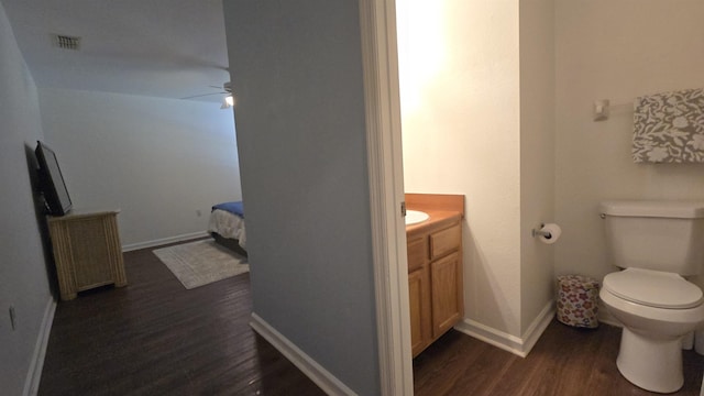 2301 Timber Oaks Ln Bldg 2, Tallahassee, FL 32304 - ensuite bathroom featuring vanity, wood finished floors, toilet, and baseboards