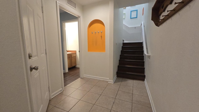 2301 Timber Oaks Ln Bldg 2, Tallahassee, FL 32304 - stairway with tile patterned flooring and baseboards
