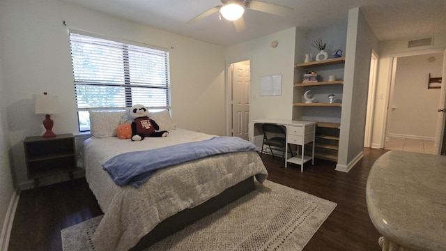 2301 Timber Oaks Ln Bldg 2, Tallahassee, FL 32304 - bedroom with dark wood-type flooring, ceiling fan, and baseboards