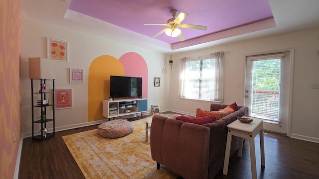 2301 Timber Oaks Ln Bldg 2, Tallahassee, FL 32304 - living room featuring a tray ceiling, dark wood-style flooring, baseboards, and a ceiling fan