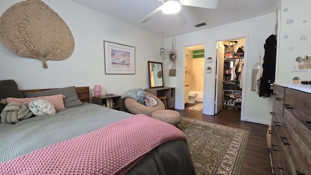 2301 Timber Oaks Ln Bldg 2, Tallahassee, FL 32304 - bedroom with wood finished floors, a walk in closet, a closet, ensuite bathroom, and a ceiling fan