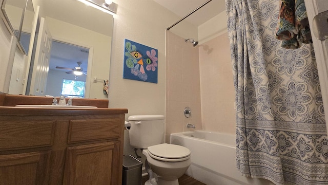 2301 Timber Oaks Ln Bldg 2, Tallahassee, FL 32304 - bathroom featuring shower / bath combo with shower curtain, toilet, vanity, and ceiling fan