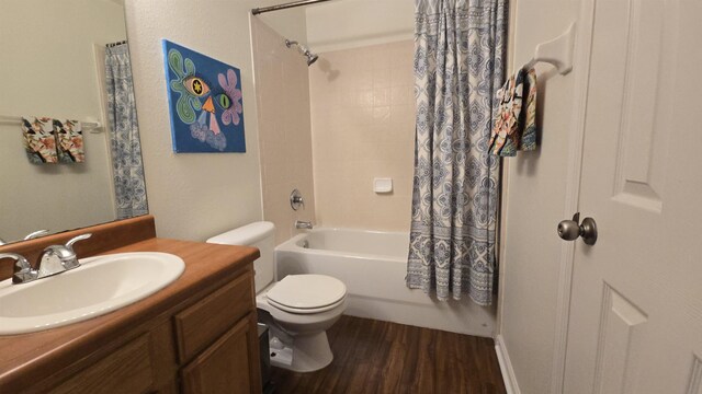 2301 Timber Oaks Ln Bldg 2, Tallahassee, FL 32304 - full bathroom with toilet, wood finished floors, shower / bath combo with shower curtain, and vanity