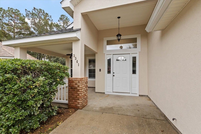 property entrance with covered porch