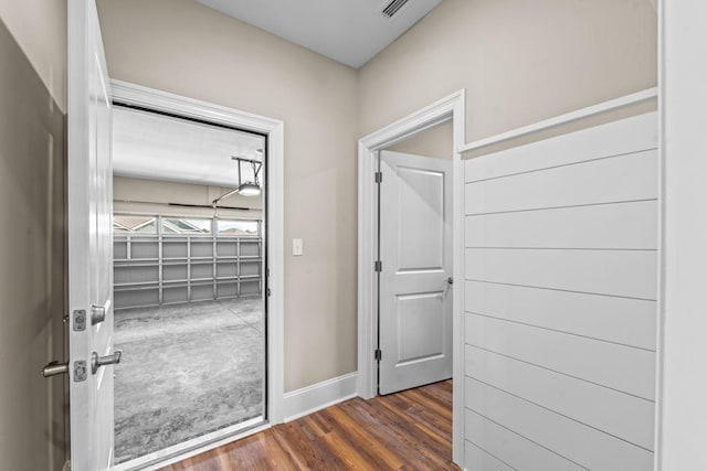 hall featuring dark hardwood / wood-style floors