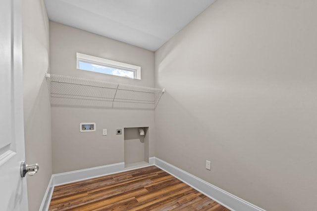 clothes washing area with dark hardwood / wood-style flooring, hookup for a washing machine, and hookup for an electric dryer