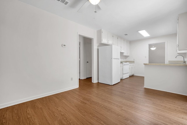 5804 Old Forge Ct, Tallahassee, FL 32317 - unfurnished living room with light wood-style floors and ceiling fan
