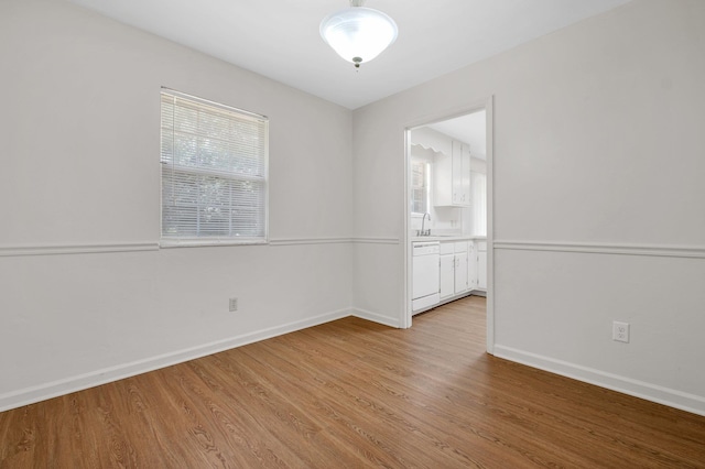 5804 Old Forge Ct, Tallahassee, FL 32317 - spare room featuring light wood-style flooring and baseboards