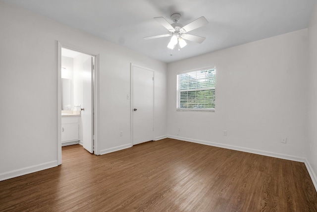 5804 Old Forge Ct, Tallahassee, FL 32317 - unfurnished bedroom featuring wood finished floors, ceiling fan, and connected bathroom