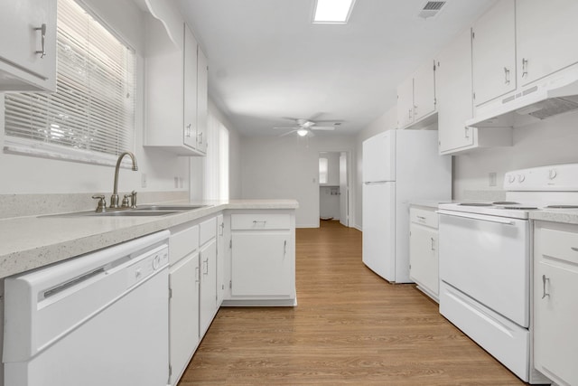 5804 Old Forge Ct, Tallahassee, FL 32317 - kitchen with white appliances, under cabinet range hood, and white cabinets