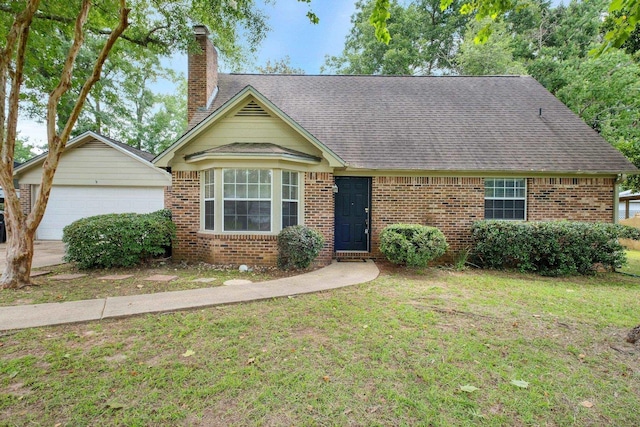 5804 Old Forge Ct, Tallahassee, FL 32317 - view of front of property featuring a chimney, brick siding, and a front lawn