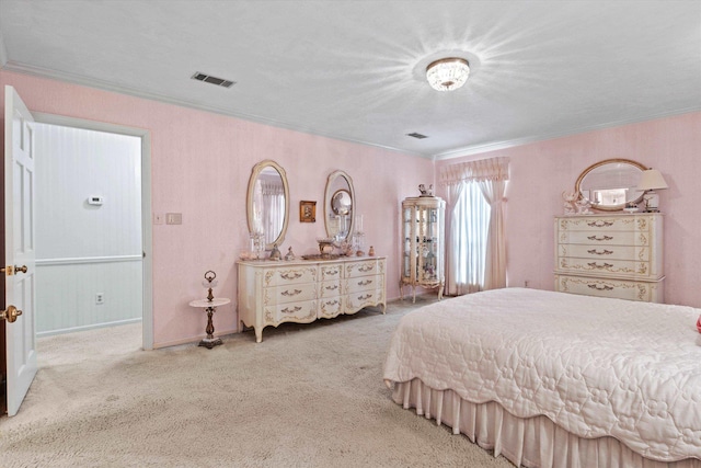 carpeted bedroom with crown molding