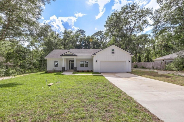 10096 Green Fountain Rd, Tallahassee, FL 32305 - view of front of house featuring driveway and a garage
