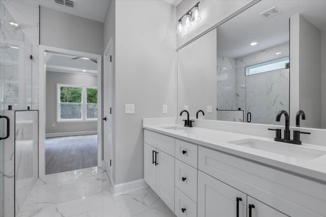 10096 Green Fountain Rd, Tallahassee, FL 32305 - full bathroom featuring marble finish flooring, double vanity, a marble finish shower, baseboards, and recessed lighting