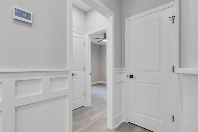 10096 Green Fountain Rd, Tallahassee, FL 32305 - hallway featuring light wood finished floors and baseboards