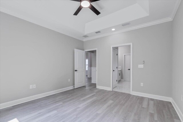 10096 Green Fountain Rd, Tallahassee, FL 32305 - unfurnished bedroom featuring ornamental molding, light wood-style flooring, baseboards, and a ceiling fan