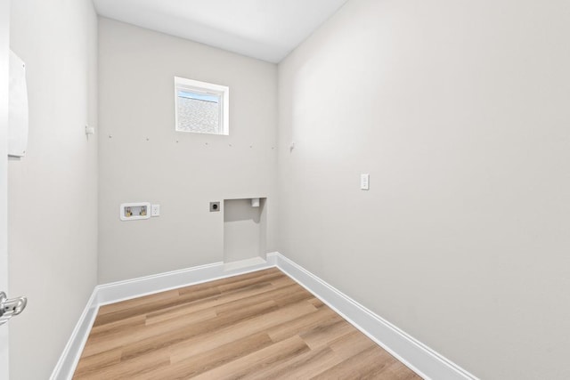 laundry room featuring hardwood / wood-style flooring, washer hookup, and hookup for an electric dryer