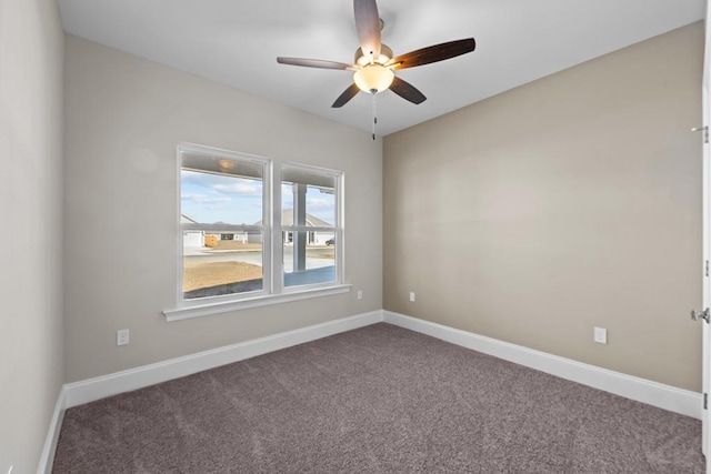 carpeted empty room with ceiling fan