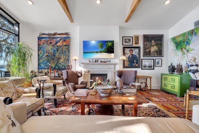 living room with beamed ceiling