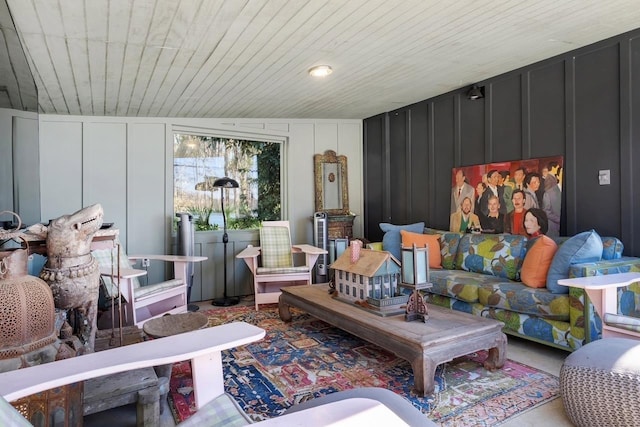 living room featuring wooden ceiling and vaulted ceiling