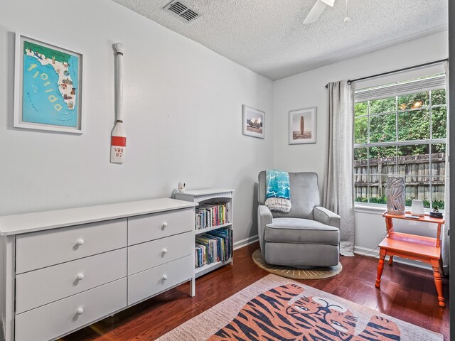 7214 Jaffrey Ct, Tallahassee, FL 32312 - sitting room featuring wood finished floors, a textured ceiling, baseboards, and ceiling fan