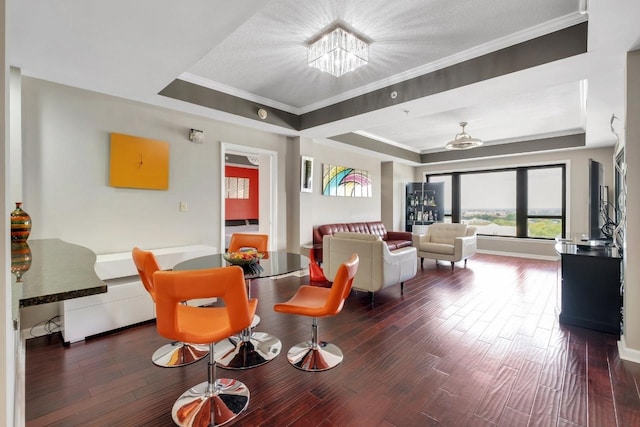 121 N Monroe St Unit 1207, Tallahassee, FL 32301 - living room with a tray ceiling, a chandelier, ornamental molding, and wood finished floors