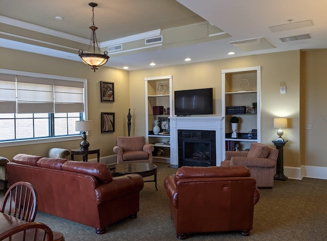 121 N Monroe St Unit 1207, Tallahassee, FL 32301 - living area with carpet flooring, built in features, a fireplace, recessed lighting, and a raised ceiling