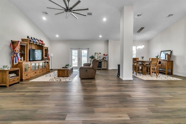 living room with dark wood-type flooring, french doors, and visible vents