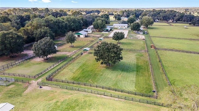 birds eye view of property with a rural view