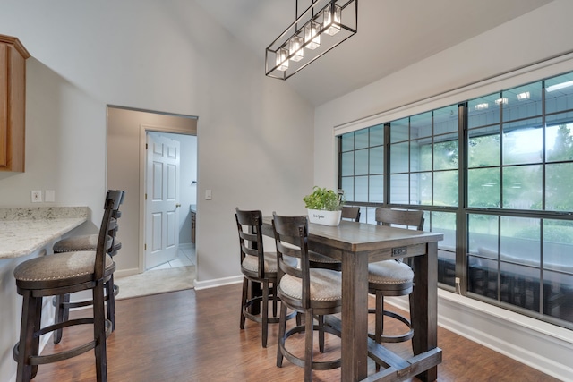 1989 Setting Sun Trl, Tallahassee, FL 32303 - dining area with dark wood finished floors and high vaulted ceiling