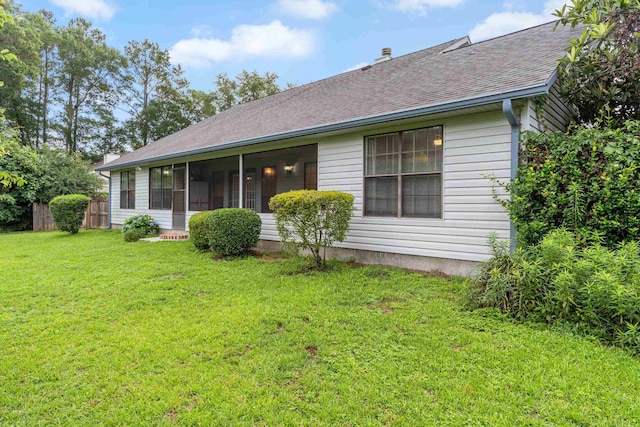 1989 Setting Sun Trl, Tallahassee, FL 32303 - back of property featuring a sunroom and roof with shingles