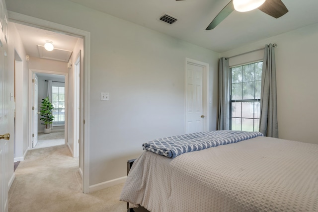 1989 Setting Sun Trl, Tallahassee, FL 32303 - bedroom featuring light carpet, attic access, and ceiling fan